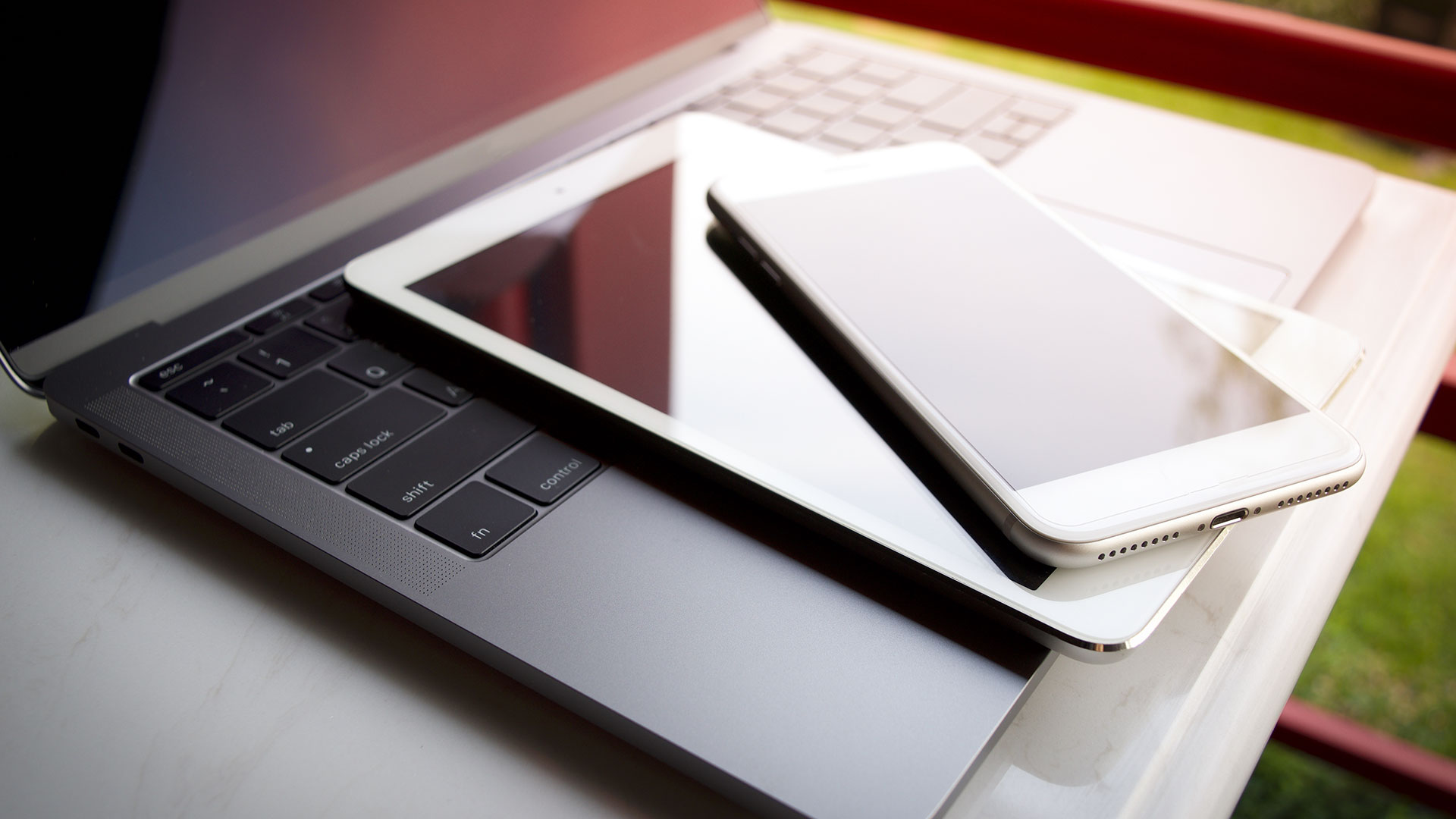 laptop-tablet-phone-table-outdoors